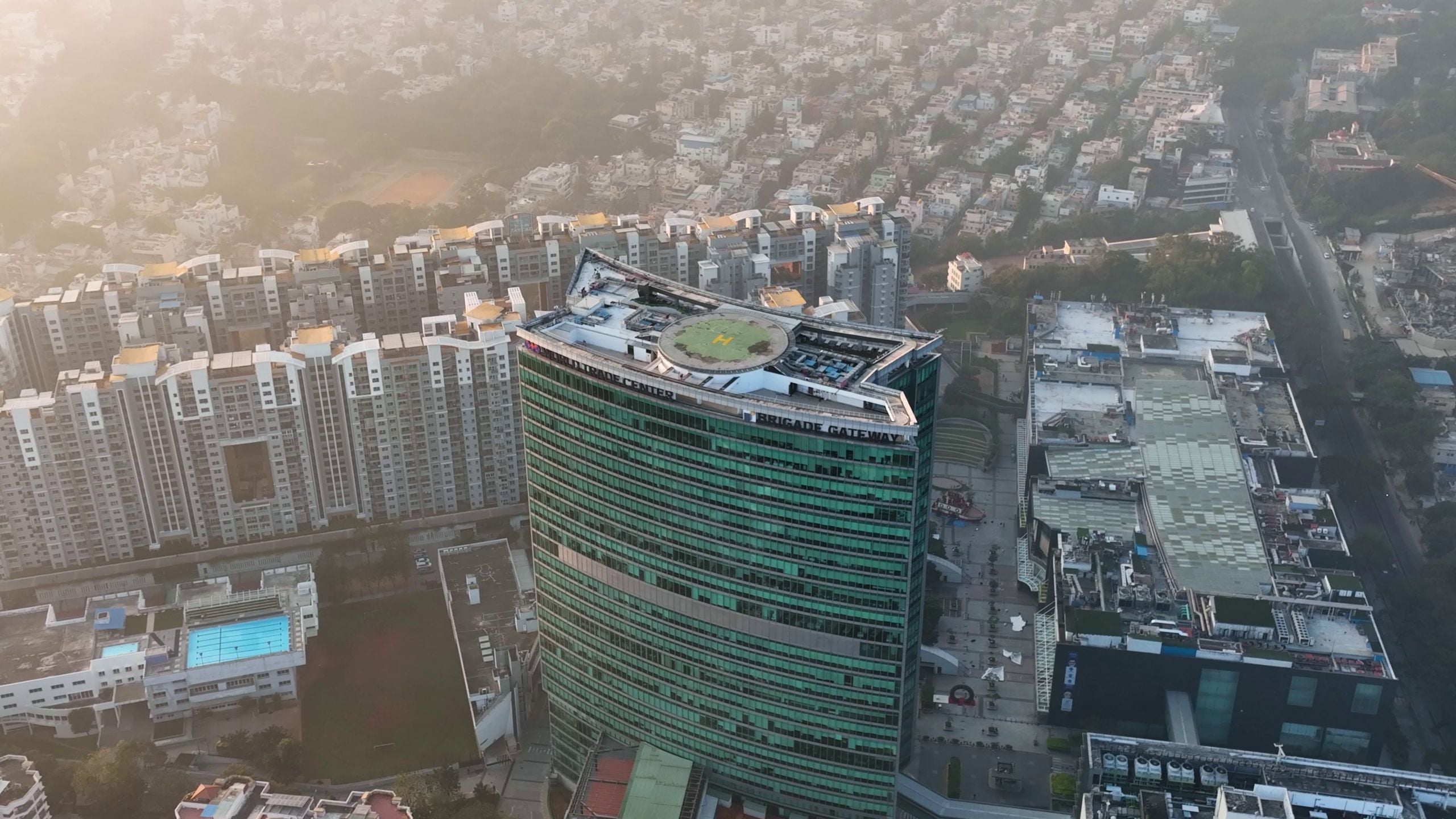 Aerial view of high-rise towers in early morning light